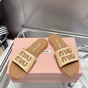 Miu Miu Platform Slides – Trendy Elevated Slip-On Sandals